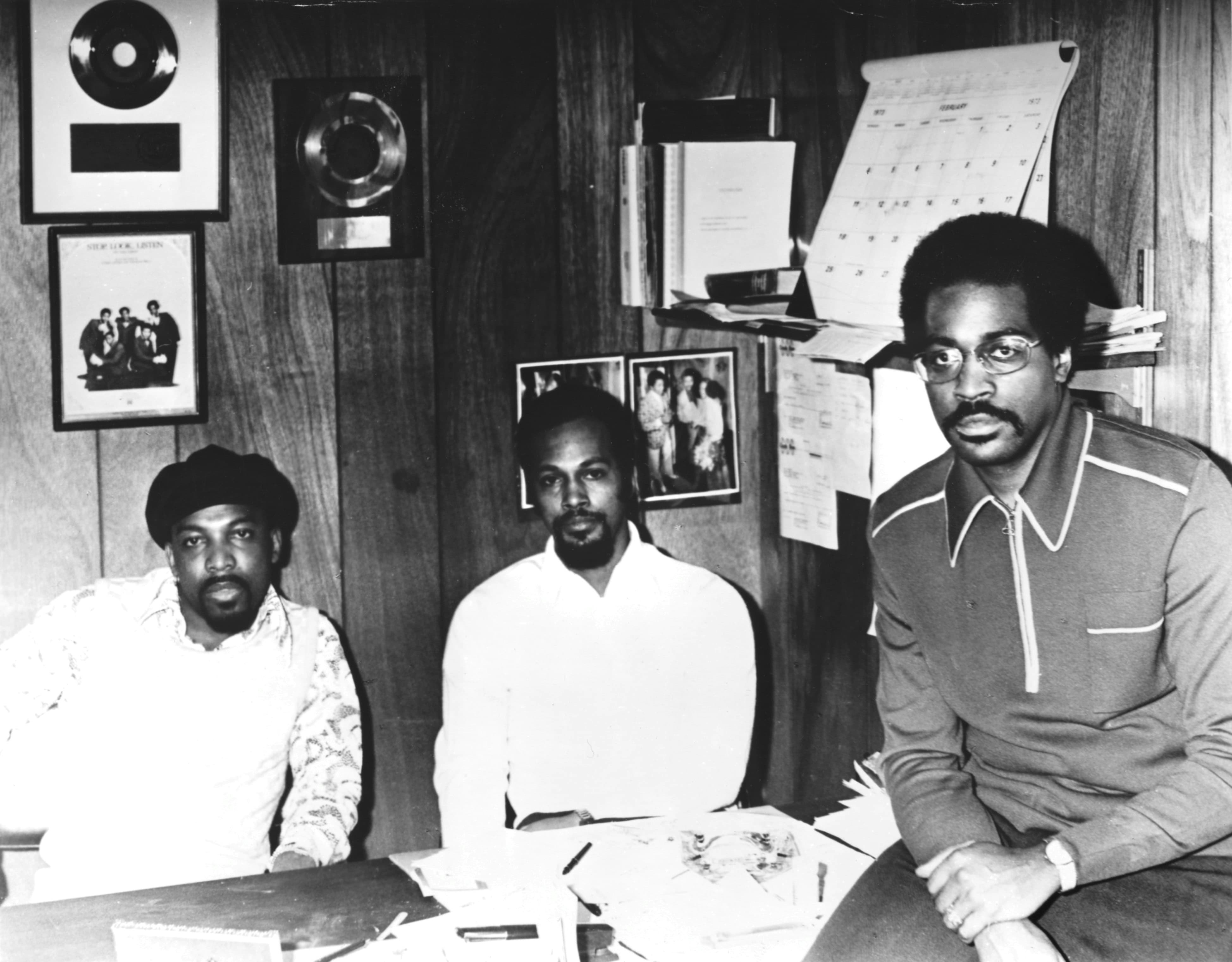 Songwriters Leon Huff (left) and Kenny Gamble (right) welcome Thom Bell (middle) as part of their new production company and partnership, the Great Philadelphia Trading Company, in Philadelphia, February 1973. Photo by Michael Ochs Archives/Getty Images.